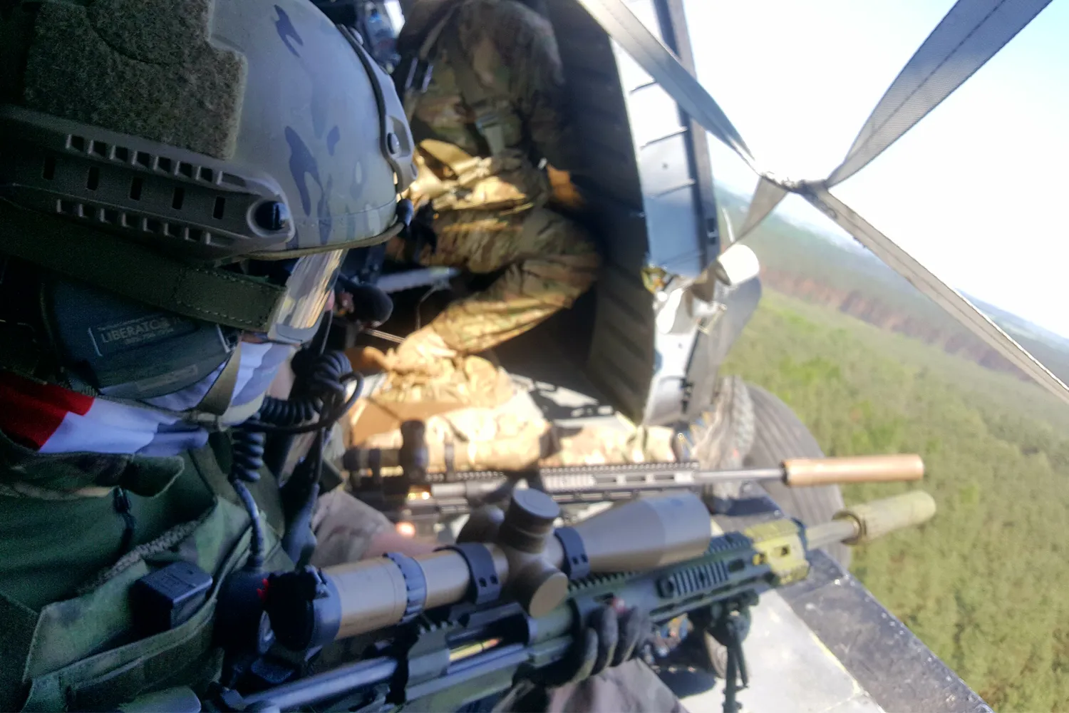 Sniper operations training with helicopter insertion